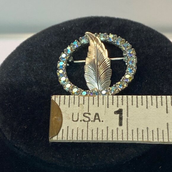 Vintage Aurora Borealis Rhinestone Circle Pin With Silver-Toned Feather Design - Picture 10 of 10